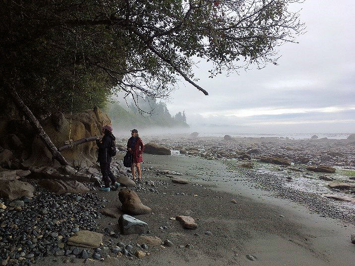 Christina merkley walking along muir beach on vancouver island british columbia