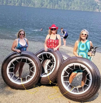 Christina merkley and friends inner tubing at sprout lake on vancouver bc