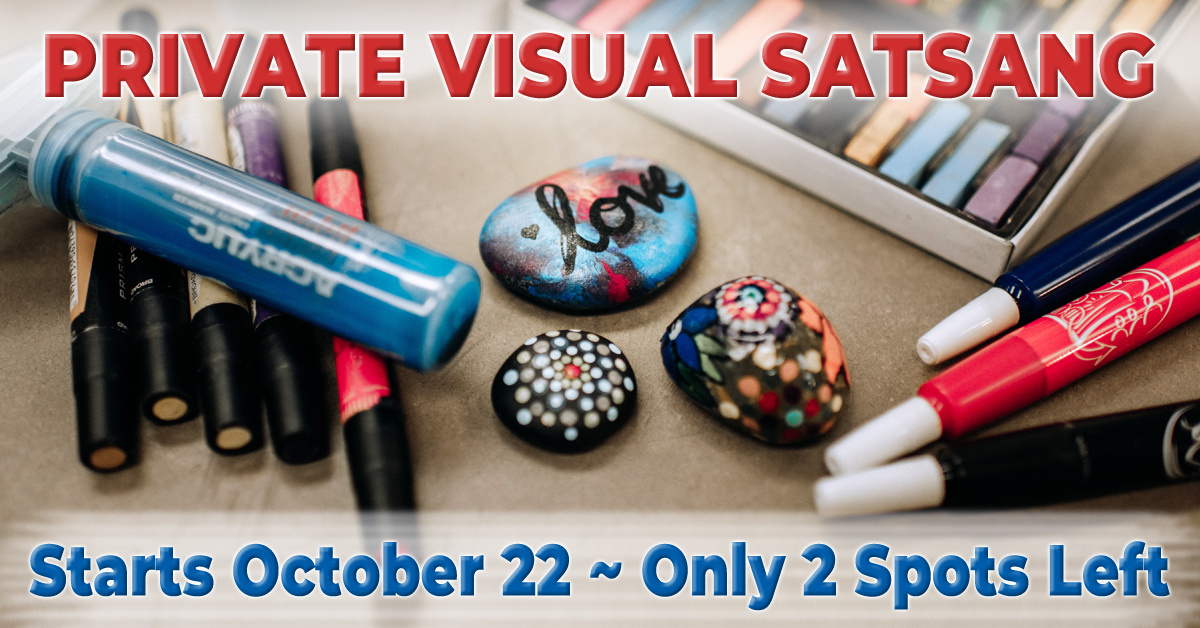 desk covered in pens and painted rocks for Visual Satsang