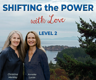 Banner for Shifting the Power Level 2 shows Christina Merkley and Anneke Lucas standing together and smiling at the camera, both in blue. Against the beautiful ocean backdrop of the straits of Juan de Fuca.