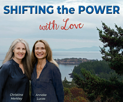 Banner for Shifting the Power with Love shows Christina Merkley and Anneke Lucas standing together and smiling at the camera, both in blue. Against the beautiful ocean backdrop of the straits of Juan de Fuca.